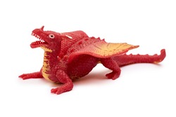plastic dragon toy isolated on white background.
