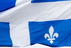 The flag of Quebec in the wind