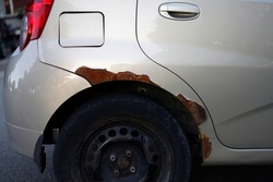 a car with rust on its paint