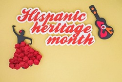Creative paper craft Hispanic heritage month flat lay with salsa dancer and guitar