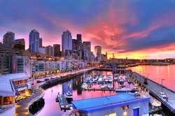 Famous Seattle skyline dazzling under a beautiful dawn sky across pier-66 waterfront