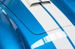 Blue and White Striped Hood with Hood Vent of Classic Car