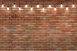  brick wall with bulb lights lamp. nice brick show room with spotlights. 