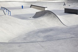 Garden design and landscaping: New built modern skate park with various lanes, bowls, transitions and obstacles. Close up, texture , background.