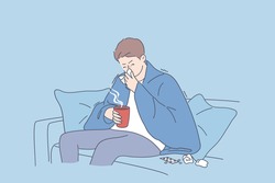 Flu, fever, infection concept. Sad man cartoon character sitting on sofa in warm blanket with hot drink and feeling ill sick and flu sneezing vector illustration 