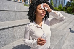 Multiracial woman got heatstroke in the scorching sun