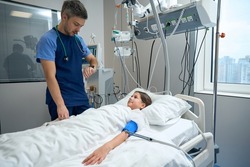 Kid in intensive care on breathing support in clinic
