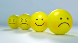 Small yellow balls showing different types of emotions