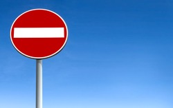 No entry for vehicular traffic. Road sign against blue sky. Space for text.