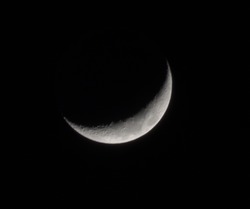 Crescent moon in black background 