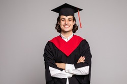Young graduation man on white background