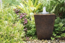 water feature in garden is Chinese belief   fountain from pot  put on right front of house is lucky