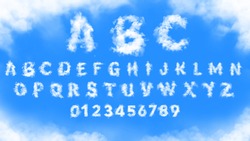 Clouds alphabet and numbers in the blue sky