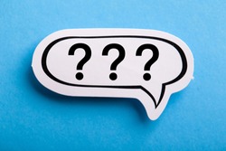Question Mark speech bubble isolated on blue background.
