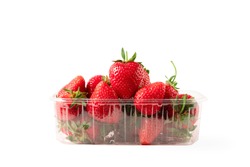 Strawberry In Plastic Container Isolated On White Background. Strawberries In Clear Punnet Closeup Front View.