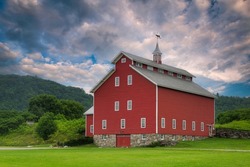 Aerial Drone Photo Restored Red Monitor Barn in Vermont