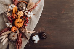 Rustic mockup with autumn table decoration. Floral interior decor for fall holidays
