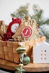 Handmade advent calendar. Gift bags for Xmas. Eco friendly Christmas gifts diy concept 