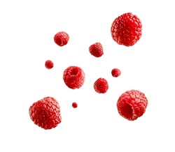 Fresh ripe raspberries flying in the air isolated on white background. Food levitation