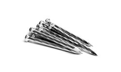 Pile Of Silver Shiny Sharp Metal Nails Closeup Photo Isolated On White Background