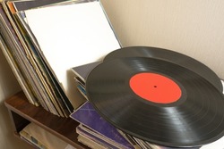 a bunch of old vinyl records. Retro music recording.