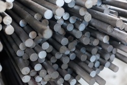 Round rolled steel stored in the warehouse. Designed for wholesale, retail sale or for the manufacture of parts at the plant or fittings for the construction