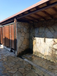 Modern public toilet and showers in the destroyed antique city of Faselis in the south of Turkey