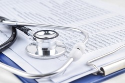 Selective focus image stethoscope over a document serial code. Medical concept