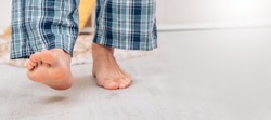 bare feet walking on the floor at home