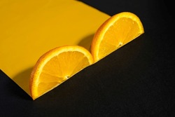 slices of orange. Orange on a black background.