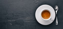 Espresso coffee On a wooden background. Top view. Free space for your text.