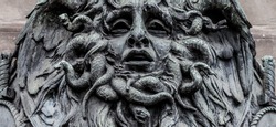 Italy, Turin. This city is famous to be a corner of two global magical triangles. This is a Medusa's head made of bronze close to the historical garden of Valentino in Turin.