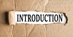 INTRODUCTION, text on white paper on torn paper background