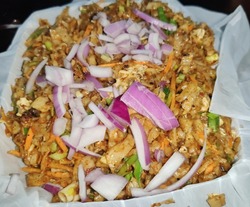 Delicious spicy Sri Lankan chicken kottu for dinner. Asian street food. Sri Lankan kottu dish