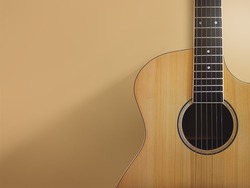 elegant classical guitar with shadow on the wall
