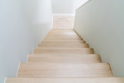 Brown wooden stairs in a modern house from above. stairs in home