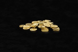 10 cent golden euro cent money pieces as a pile