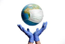 World Epidemic Danger. World need protect the earth globe with a face mask and hands, isolated on a white background. Human Epidemic Danger. Earth globe with Hungarian text.
