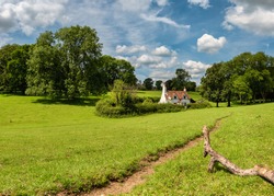 English landscape with old cottage and a hiking path in the Chiltern Hills, UK