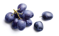 Bunch of ripe dark blue grapes Isolated on white background top view.