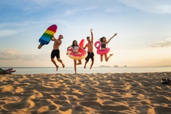 Beach friends and family on the beach. lifestyle people vacation holiday on beach. Summer holiday having fun concept.