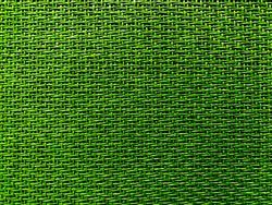 Close up green The  is woven into a net. natura rope texture as a background. Full frame of tightly woven rope pattern.with space for text, for a background.