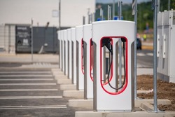 Electric car charging station, parking for electric and hybrid vehicles with chargers. Network of electric charging stations.