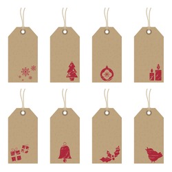 collection of brown paper tags with red christmas motifs