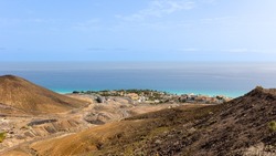 View of the village of Morro Jable and the Atlantic Ocean from the top of the mountain in Fuerteventura, Canary Islands, Spain