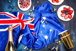 Australia Day. Australia National Day background with Australia National Flag, dessert pavlova cakes on white. Copy space