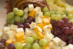 Thanksgiving Fruits and Cheeses Cornucopia  Bread on Wooden Board