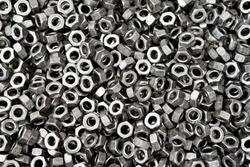 Screw, bolt and nut in black and white for industrial background
