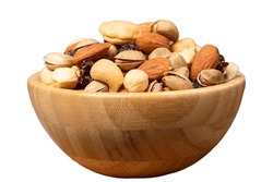 Mixed nuts isolated on white background. Special mixed nuts in wooden bowl. Hazelnut, almond, cashew, pistachio, dried blueberry. Superfood. Vegetarian food concept. healthy snacks