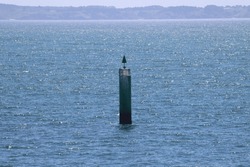 Beacon in the sea in Brittany, France